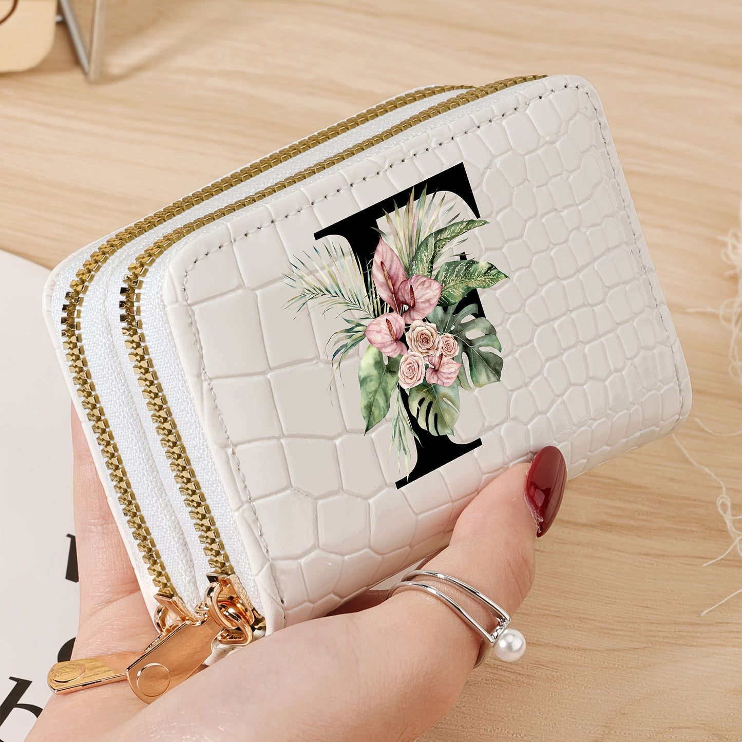 Women's credit card wallet with elegant floral letter print in black & white. Features large capacity, dual zipper, crocodile texture PU, lightweight design with nylon lining for everyday