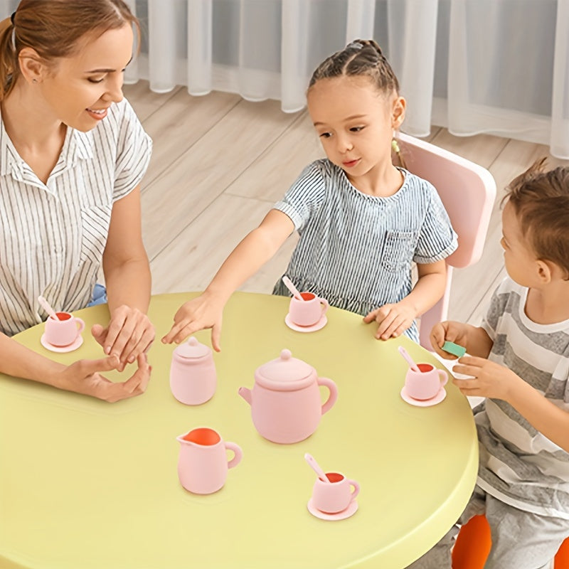 Set of silicone kitchen toys free of BPA, including a non-toxic tea cup. Perfect for pretend play for baby, children, and kids. Ideal for girls and boys, these soft silicone feeding cups also serve as early education toys. Includes miniature items and