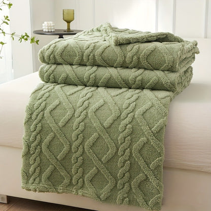 Cozy coral fleece blanket in chic diamond pattern. Ultra-soft, warm, and comfortable for bed, sofa, or travel. Available in beige, green, pink, and blue. Made of lightweight polyester. Hand wash only.