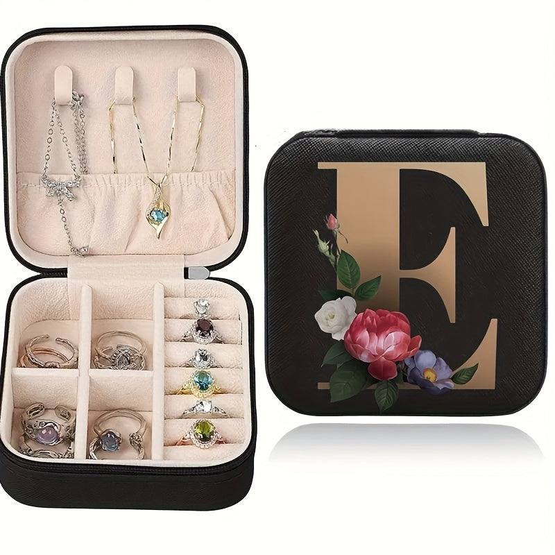 Floral initial jewelry organizer box with compact design, soft velvet lining, durable zipper, and lightweight, ideal for jewelry organization and travel.