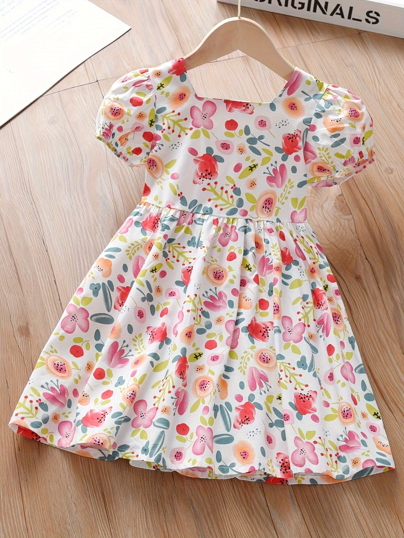 Summer dress with cute floral print and puff sleeves for girls