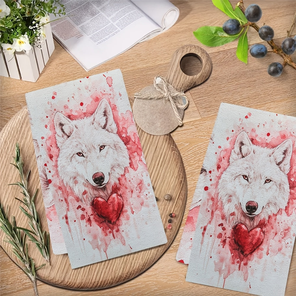 Set of 2 Ultra Soft Kitchen Towels featuring a Valentine's Day Wolfy design. These highly absorbent and machine washable dish hand towels measure 40.64x60.96 cm. The contemporary white towels are accented with red splashes and a heart detail, perfect for