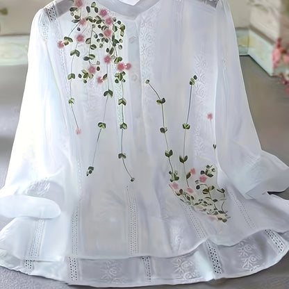 Elegant floral blouse for women, sheer polyester with lace detailing, round neck, perfect for spring/summer. Great for semiformal occasions. Features smocking technique.