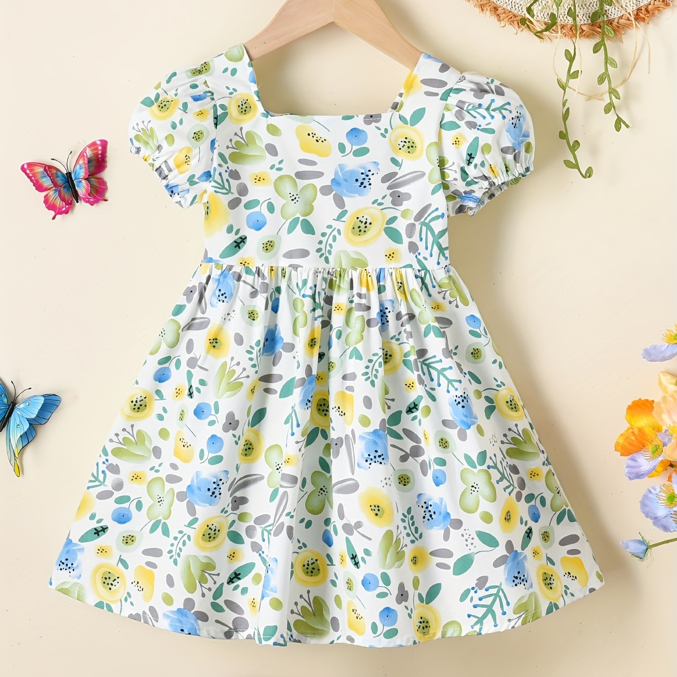 Summer dress with cute floral print and puff sleeves for girls