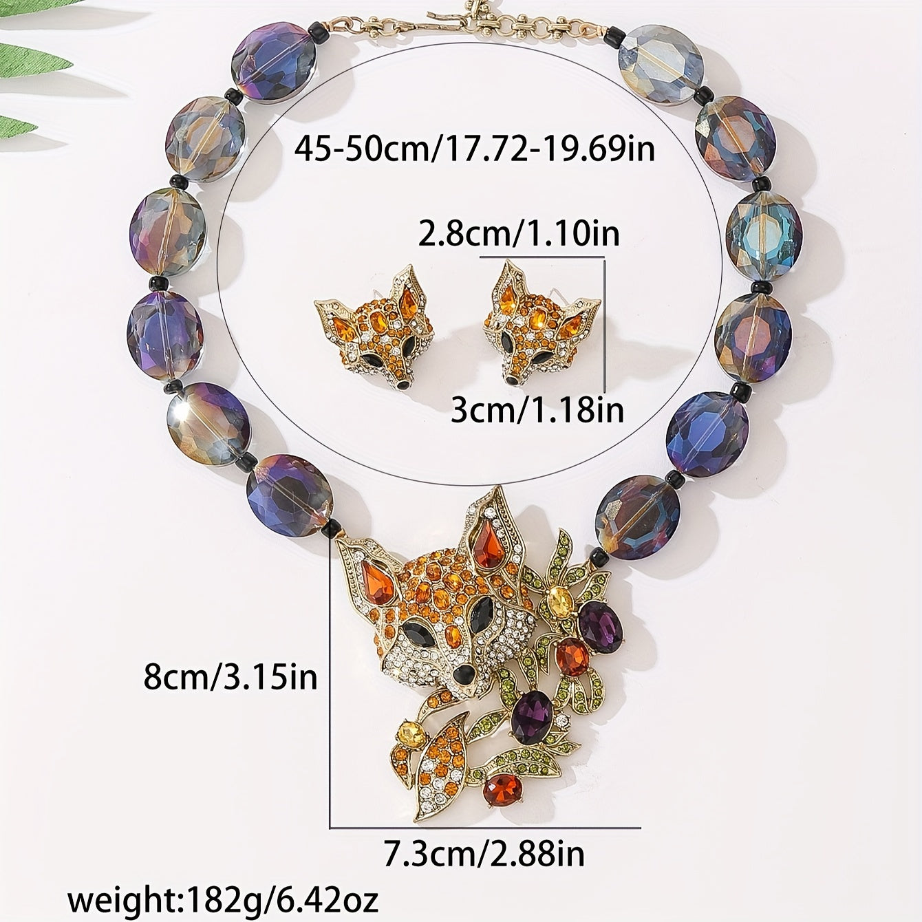 This luxury and exquisitely designed jewelry set features a pendant necklace and earrings adorned with inlaid water diamonds, fox leaves, and colorful acrylic beads. The set is elegant and fashionable, making it the perfect gift for women. It is ideal