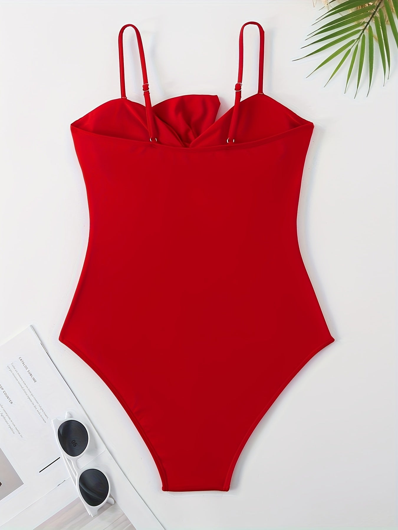 Women's vacation swimwear includes solid color two-piece and one-piece swimsuits with thin belly-controlling straps and a shaker skirt.