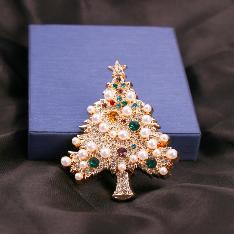 The best gift for the holidays - an elegant and luxurious crystal brooch shaped like a Christmas tree, perfect for both women and men.