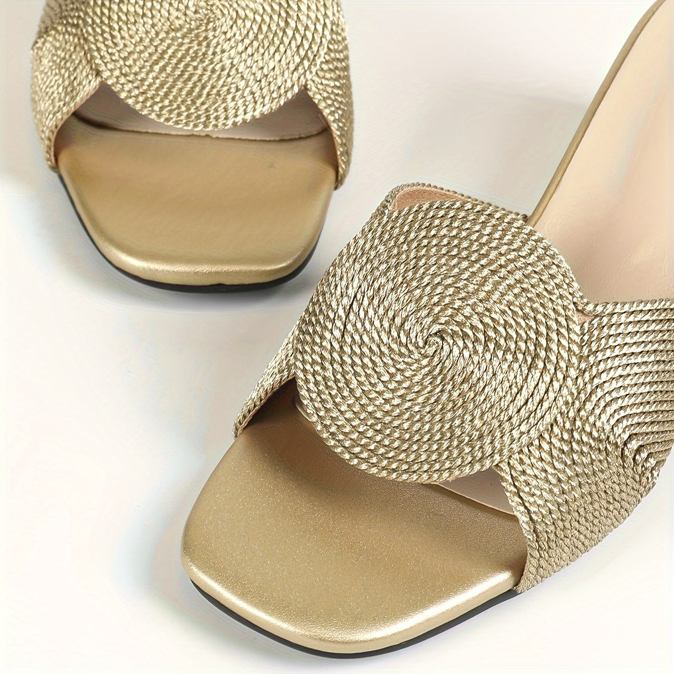 Stylish golden mid-heel sandals with linen woven fabric, open toe, and slip-on design.