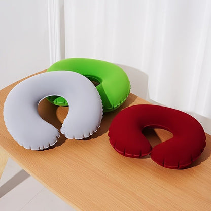 A pack of 1 or 3 ultra-comfortable inflatable C-shaped neck pillows, perfect for travel and car use. Made with soft velvet material, a zippered nylon cover, and is hand washable.