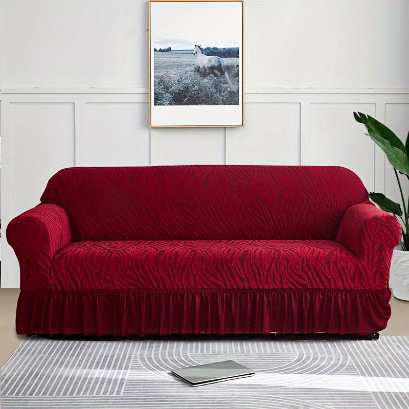 Wave pattern sofa slipcover with skirt, non-slip and dustproof. Protects furniture from cat scratches. Machine washable for easy cleaning. Suitable for bedroom, office, or living room décor.