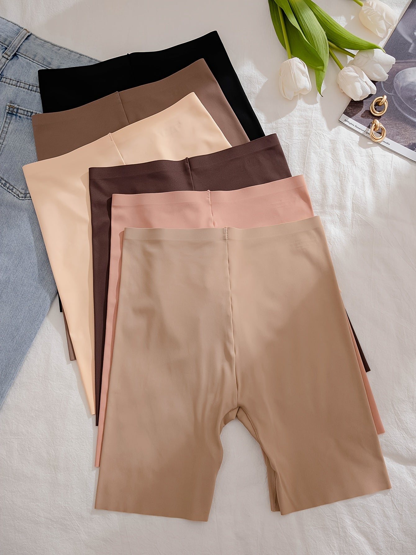 6-pack of high-waisted, flat-leg safety pants for women with traceless design, anti-slip technology, and butt-lifting and abdomen-tightening features.