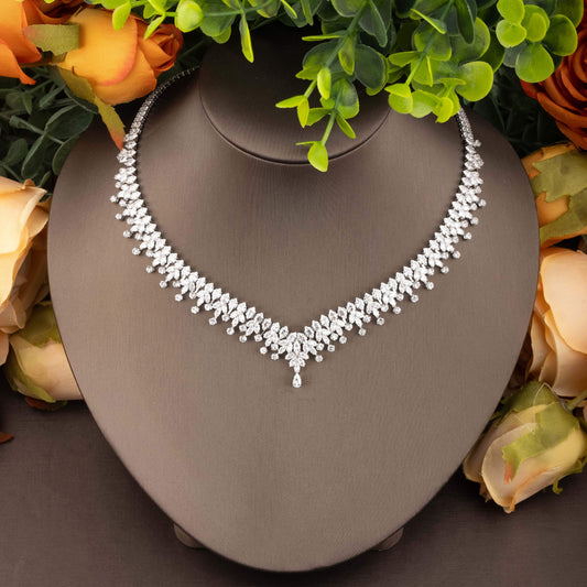 Stunning leaf-shaped cubic zirconia jewelry set designed for women - includes a luxurious necklace, earrings, bracelet, and ring perfect for weddings and special occasions.