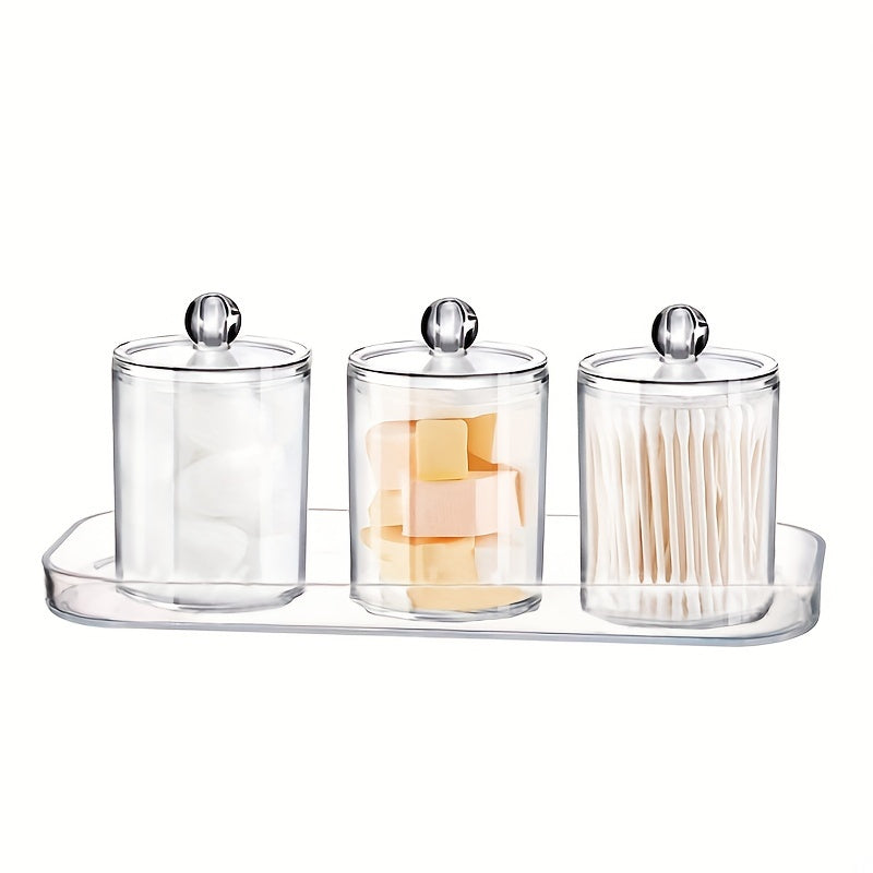 Set of 3 cotton swab/ball/pad holders with tray, apothecary jar with wood lids, and clear bathroom storage containers.