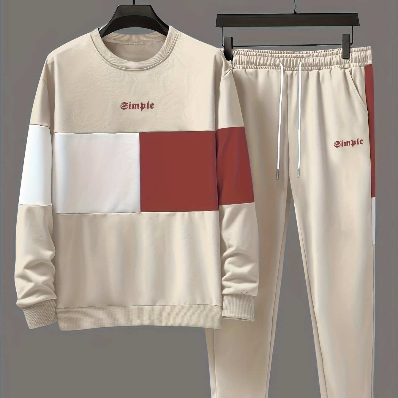 Men's casual crew neck sweatshirt and joggers set. Color block design in polyester blend, machine washable. Ideal for spring and fall, leisure style.