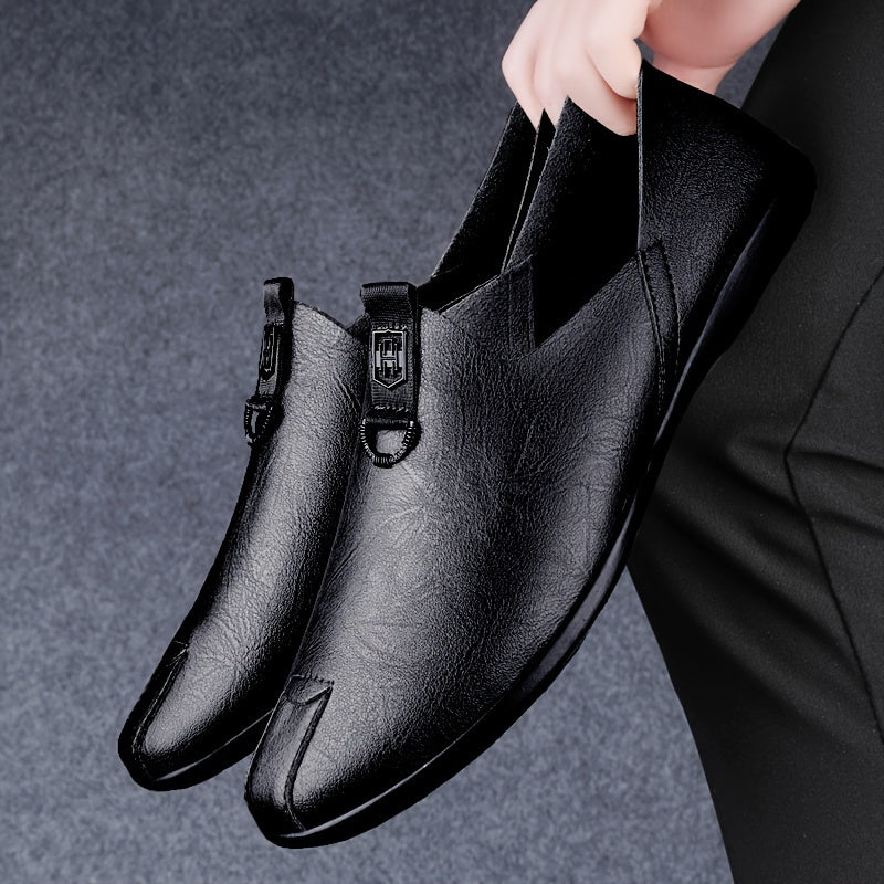 Sleek black slip-on shoes for men, breathable and fashionable with a durable sole.