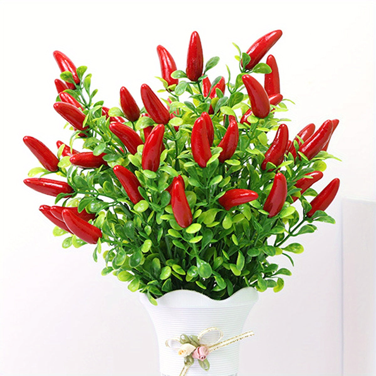 Artificial pepper chili flower bouquet for indoor or outdoor decor.