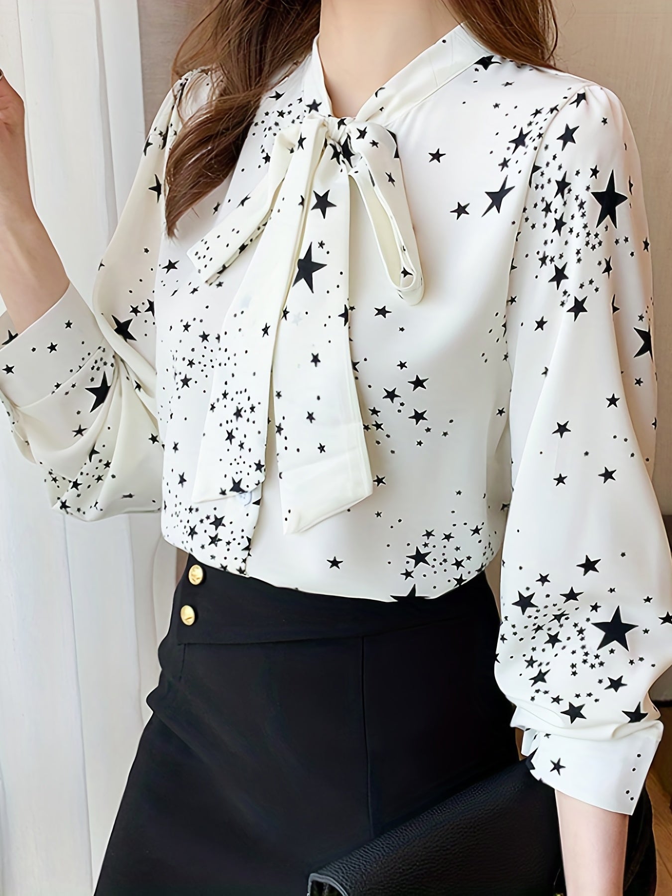 Chic long sleeve blouse with bow tie detail, made of 100% polyester and machine washable. Perfect for spring and fall fashion.