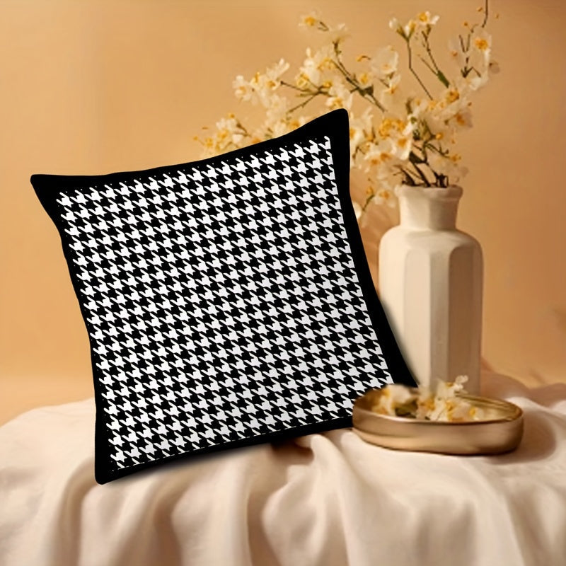 This stylish houndstooth throw pillow cover features a chic design, measuring 44.96cm square. The double-sided print is made of soft polyester and includes a convenient zip closure. Perfect for adding a touch of elegance to your living room or bedroom