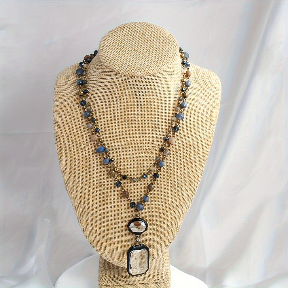 New tribal style necklace featuring two layers of natural stone crystals and glass chains, with a square glass pendant designed for daily wear by both men and women during the spring and summer seasons.