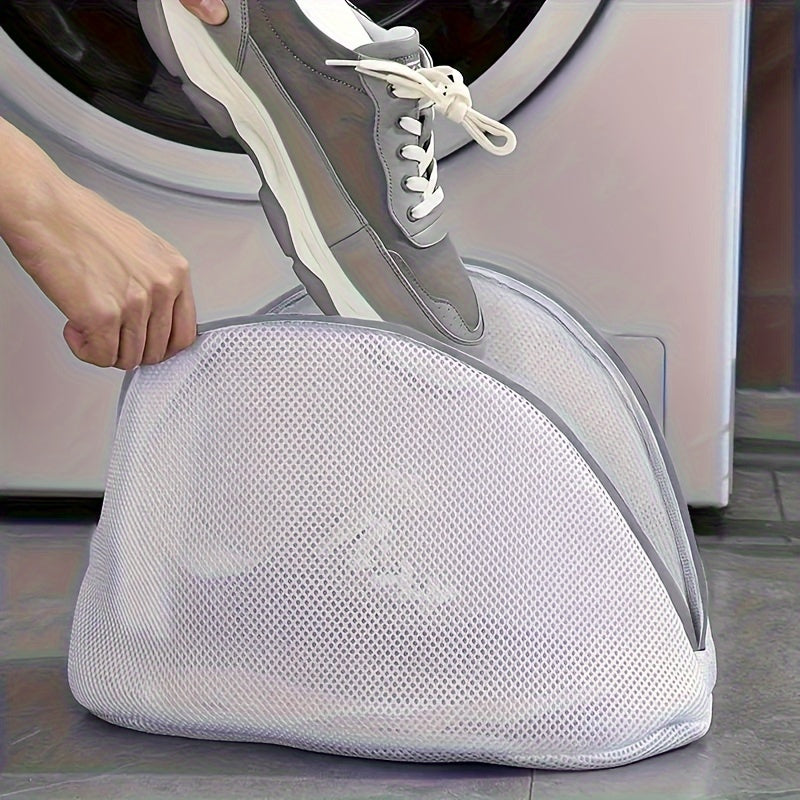 Get your hands on the 1pc Innovative Shoe Wash Bag - made from durable polyester, this zippered, oval-shaped laundry organizer is perfect for washing your shoes. It is designed to prevent deformation and comes with anti-deformation care. A must-have for