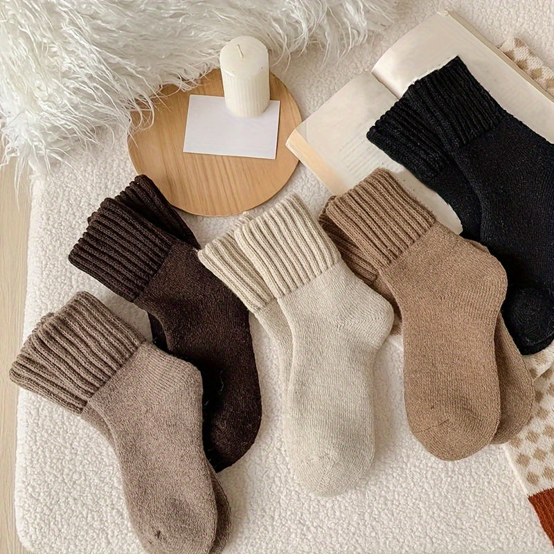 5 cozy winter socks for women in beige and brown, mid-calf length, soft polyester blend, ideal for cold weather.