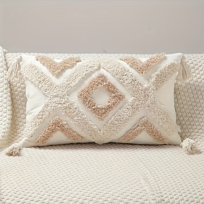 Boho beige tufted pillow cover with tassels and geometric diamond pattern, ideal for couch or bed. Made of polyester with zip closure, hand wash only. Insert not included.