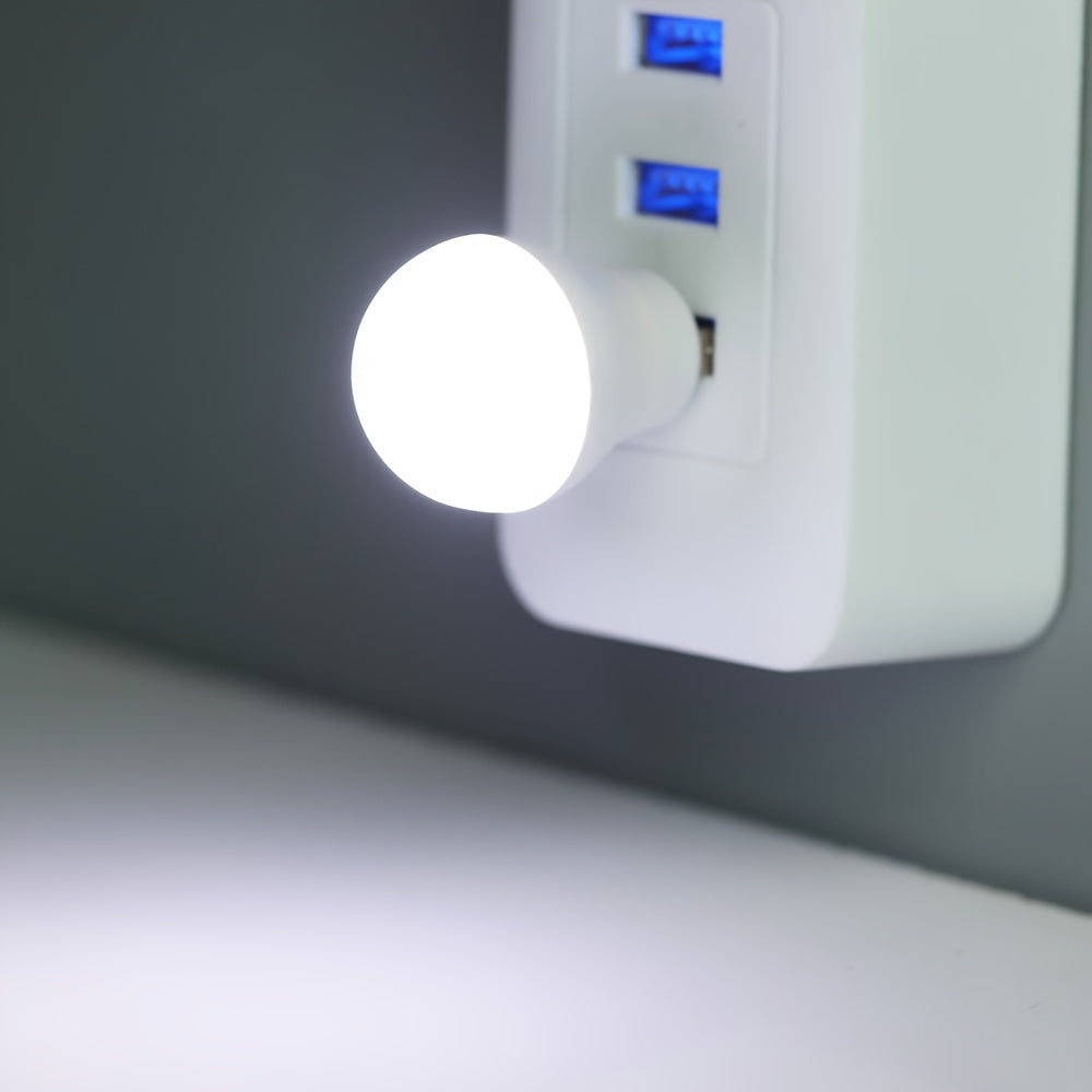 Protective eye mini USB night light available in sets of 2, 3, 5, or 10. Portable bulb design in white or warm light, ideal for reading and compatible with laptops and mobile power supplies.