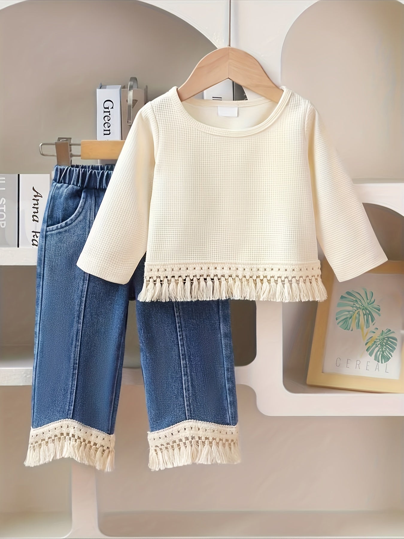 Polyester tassel top and jeans set, ideal for outdoor wear in the autumn and winter.