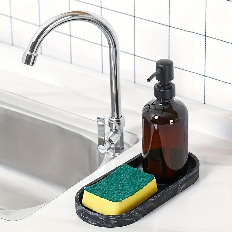 Silicone oval vanity tray with soap dispenser and sponge holder for bathroom décor.