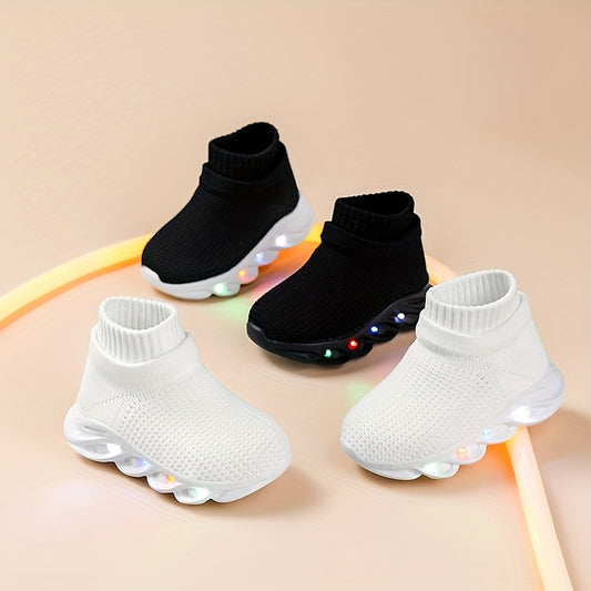 Light-up sneakers for toddlers with colorful LED lights, breathable knit fabric, non-slip EVA sole. Ideal for outdoor activities and casual wear. Available in multiple colors. Comfortable