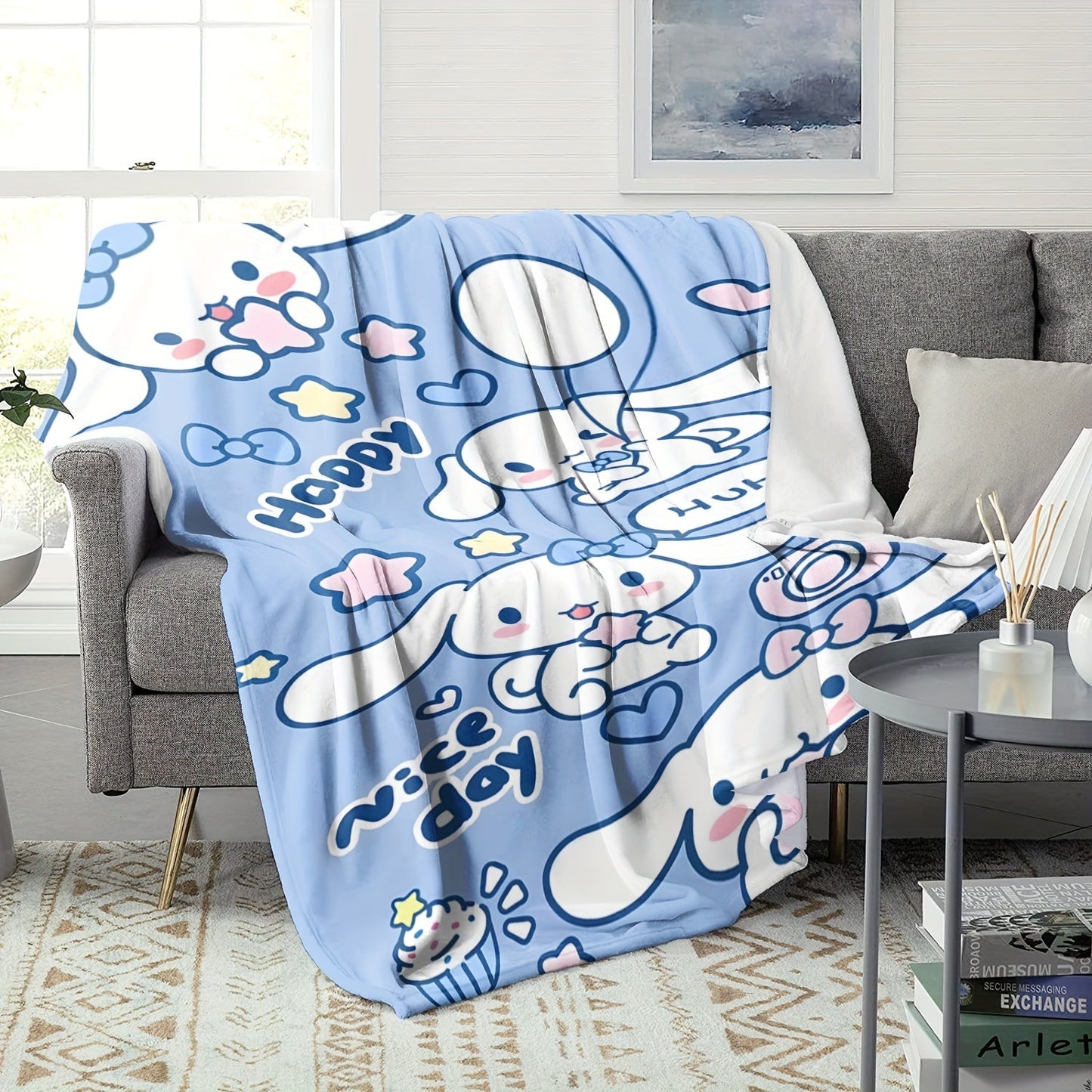 Soft and warm Sanrio Cinnamoroll plush flannel throw blanket featuring a cozy cartoon print. Perfect for adding a touch of cuteness to your bedroom, living room, or for taking on camping trips and travel adventures. This multi-purpose gift is sure to