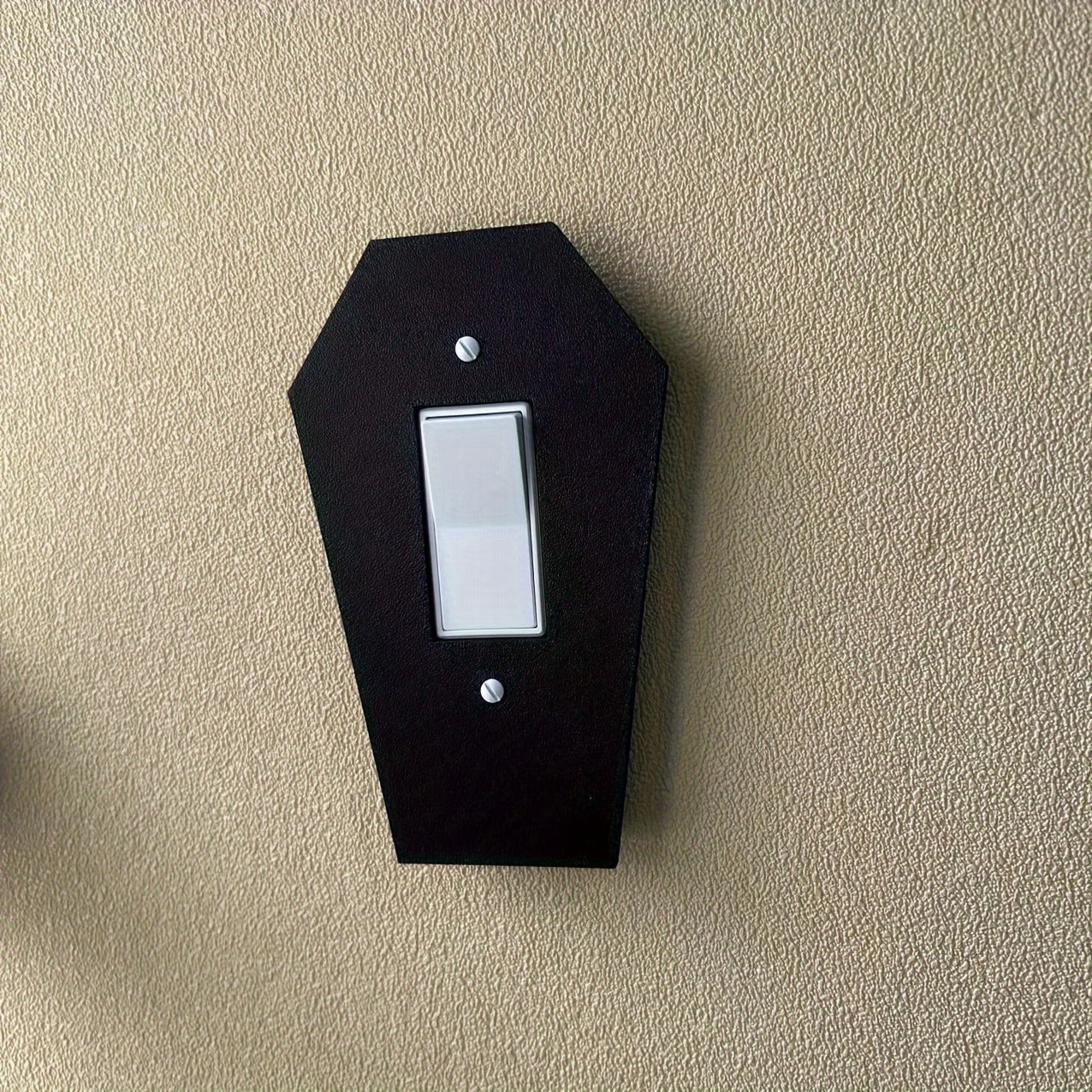 Gothic tombstone wall light with classic black design for easy installation in homes and offices.