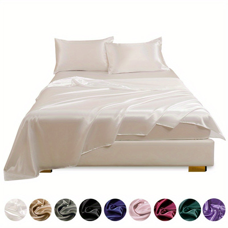 4 pieces of polyester satin solid fitted sheet set includes 1 fitted sheet, 1 flat sheet, and 2 pillowcases, available in Twin, Full, Queen, or King sizes.