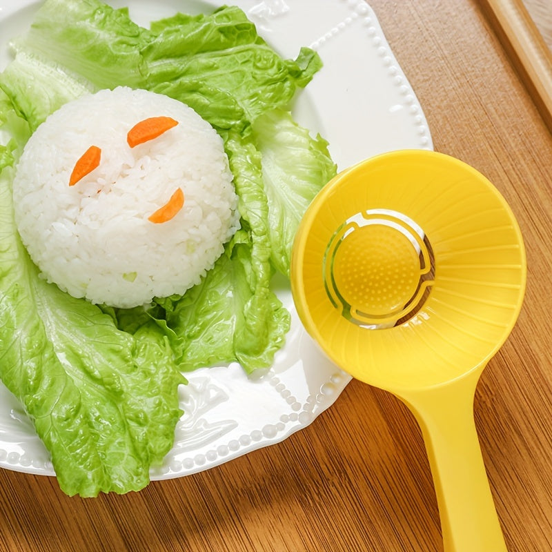 Large yellow plastic rice ball mold with easy-release feature, non-stick half-sphere design, and built-in strainer for kids' meals.