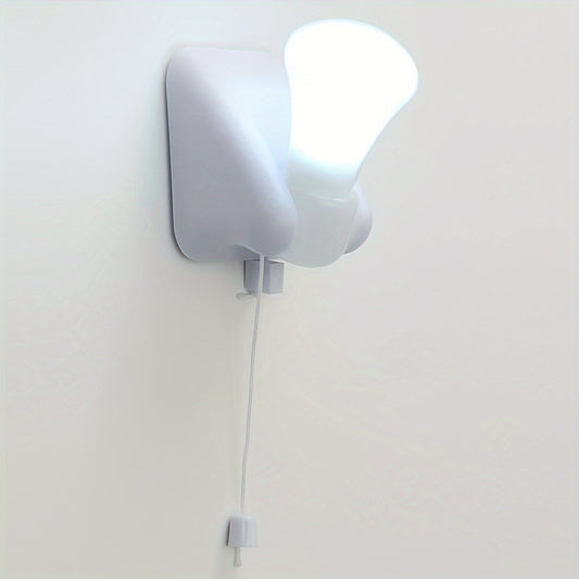 Small white LED night light; battery-powered with cordless design for bedside or cabinet; easy wall mount installation.