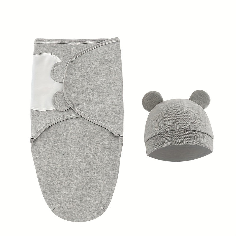 Newborn newborn swaddle set includes adjustable sleeping bag for prevention of startle reflex.