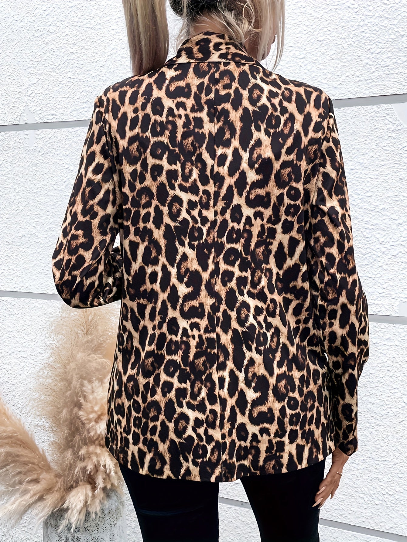 Stylish leopard print blazer for women with long sleeves, lapel collar, and button front. Suitable for both office and casual wear.