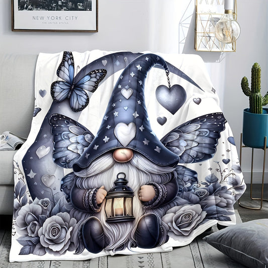 Soft, warm, and cozy, this flannel throw blanket features an enchanted gnome and butterfly print. Perfect for the couch, bed, office, or travel, this versatile all-season gift is sure to bring comfort and style to any space.