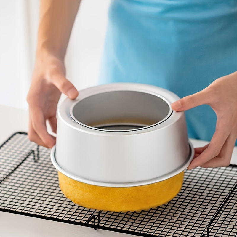 Cake Pan Set includes three pieces in sizes of 10.16cm, 15.24cm, and 20.32cm. These round aluminium cake molds have removable bottoms, making them convenient for baking cakes. Perfect addition to your kitchen tools collection.