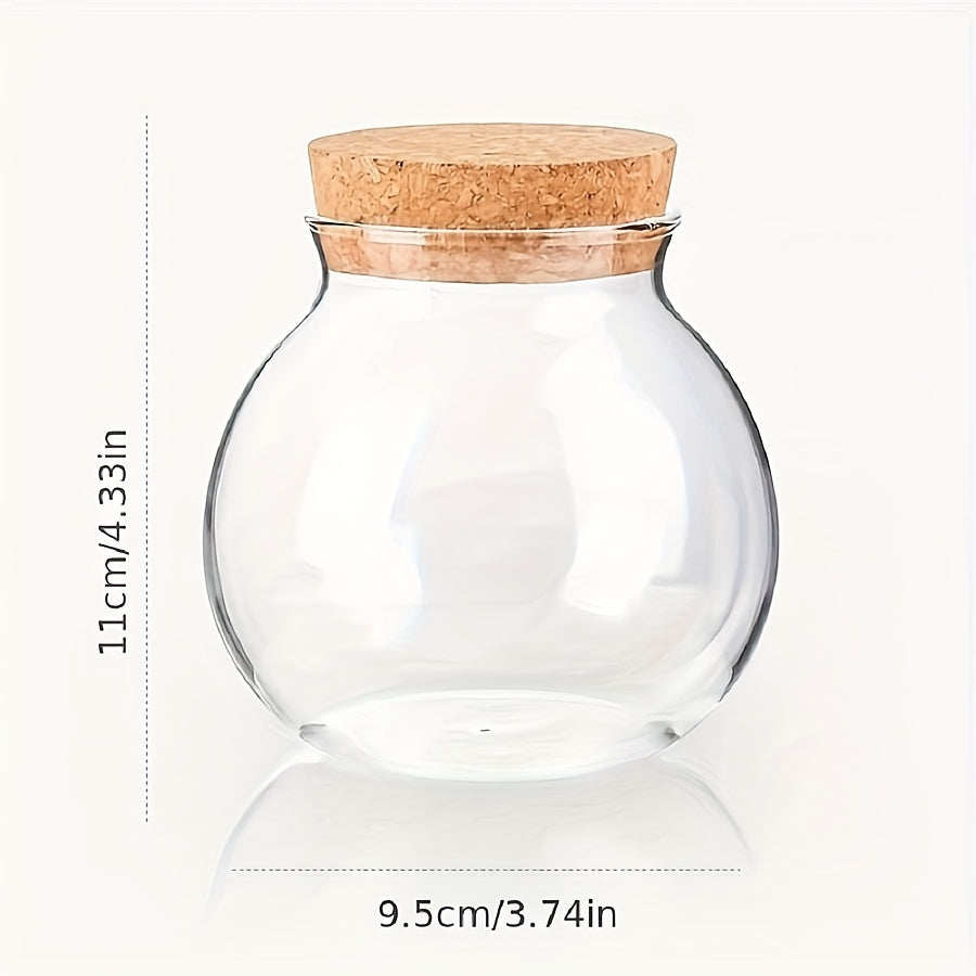 This glass storage jar with cork lid holds 16.9oz and is perfect for storing various items in your kitchen. Made of BPA-free and heat-resistant materials, it is a versatile canister that can be used for storing coffee beans, tea, flour, sugar, and more.