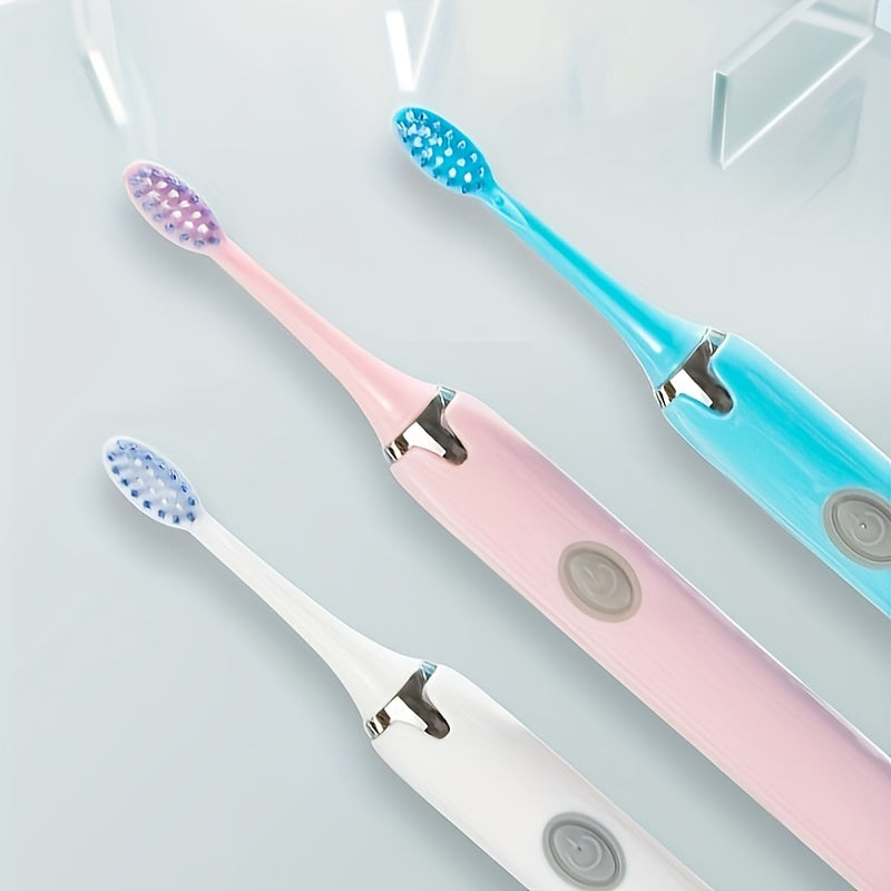 Set includes a battery-powered travel toothbrush, portable toothbrush, and 3 brush heads. Batteries not included.