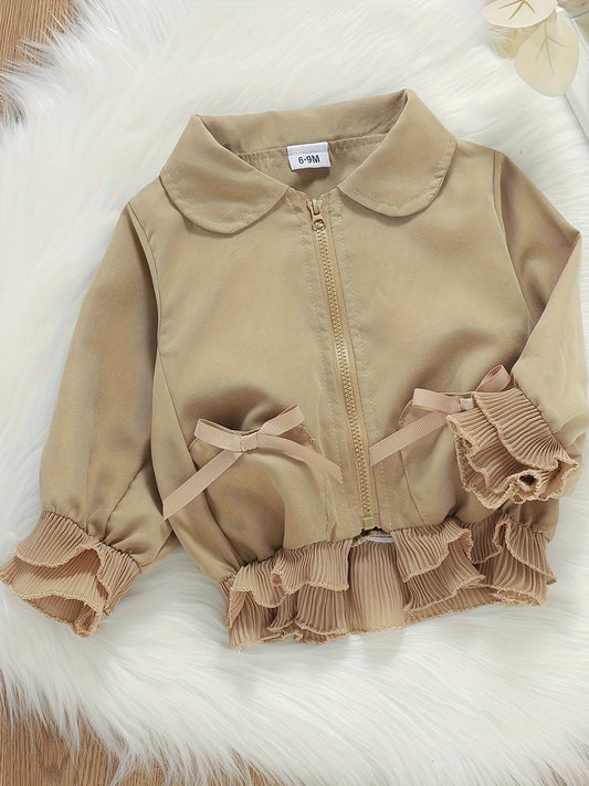 Chic beige zip-up jacket for toddler girls with ruffle detail, perfect for spring/fall fashion.