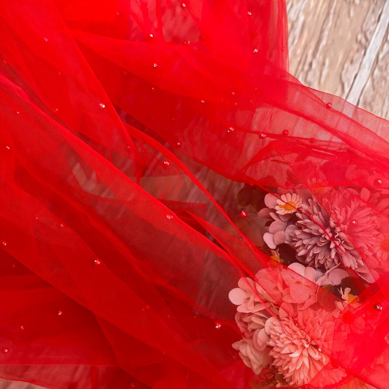 Elegant pearl bead tulle table runner, perfect for weddings and parties. Can also be used as a chair sash or backdrop drape. Made from 100% polyester fabric with delicate bead detailing.