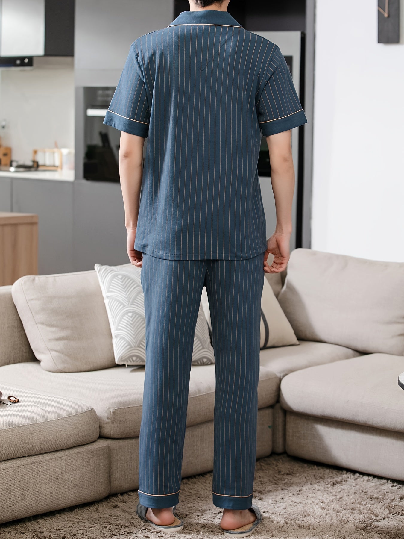 Men's navy blue stripe print pajama set with lapel collar, short sleeves, and trousers. Comfortable and skin-friendly cotton fabric for cozy loungewear.