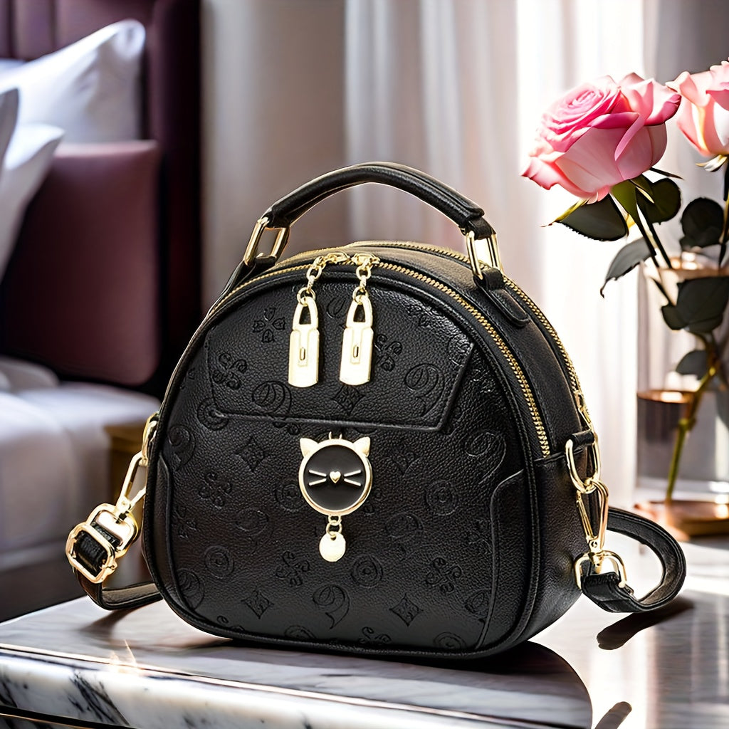 Trendy black round crossbody bag with adjustable strap, golden-tone hardware, "LOVE" design, zipper closure. Ideal for casual outings and commuting.