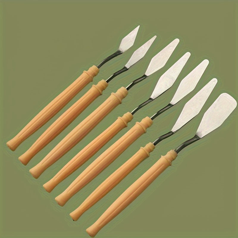 Set of stainless steel palette knives for oil painting, available in various sizes and shapes.