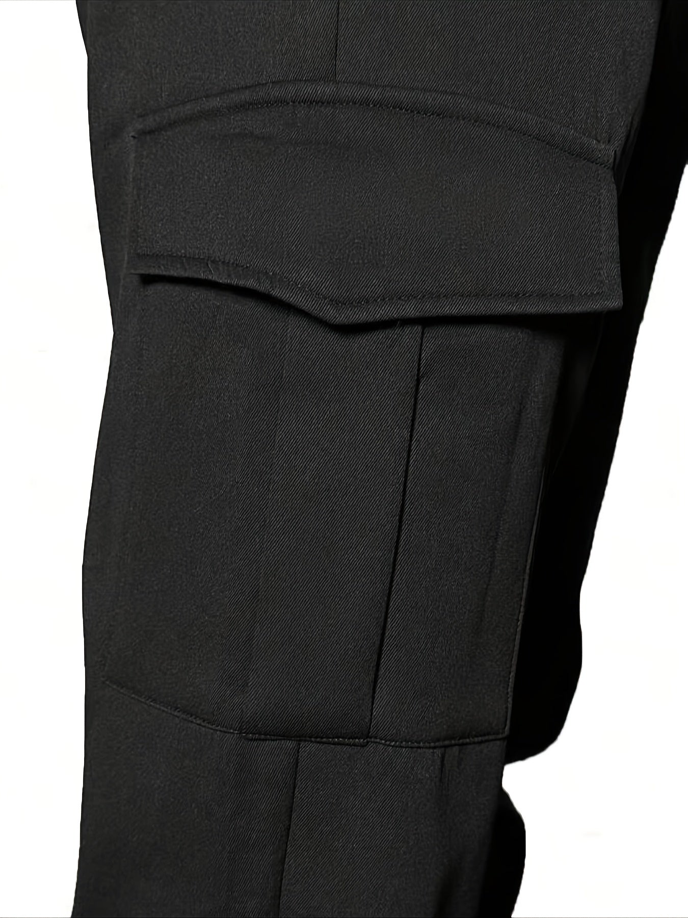 Men's winter cargo pants with solid color and non-stretch fabric, regular fit with drawstring, fleece-lined for warmth, available in plus size.