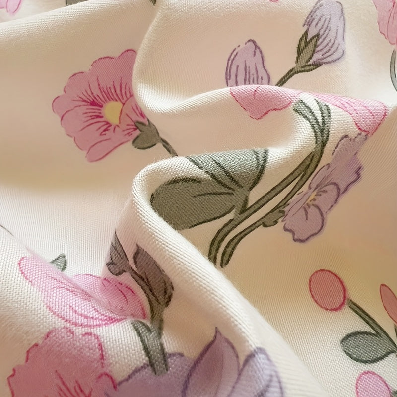 Soft floral print bedding set includes duvet cover and 2 pillowcases, made of breathable polyester with zip closure. Suitable for all seasons, perfect for bedrooms and guest rooms.