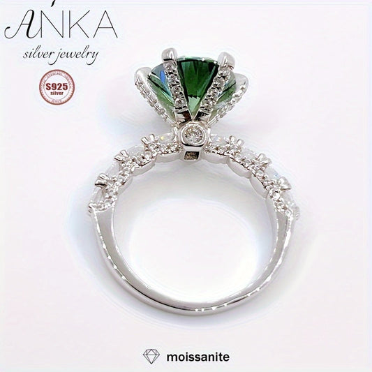 Classy S925 Sterling Silver Ring featuring a stunning 3ct Green Moissanite stone, perfect for engagements or as a luxurious gift. The band is embellished with non-plated Moissanite stones, making it suitable for all seasons. Available in sizes 3.3-3.5g.