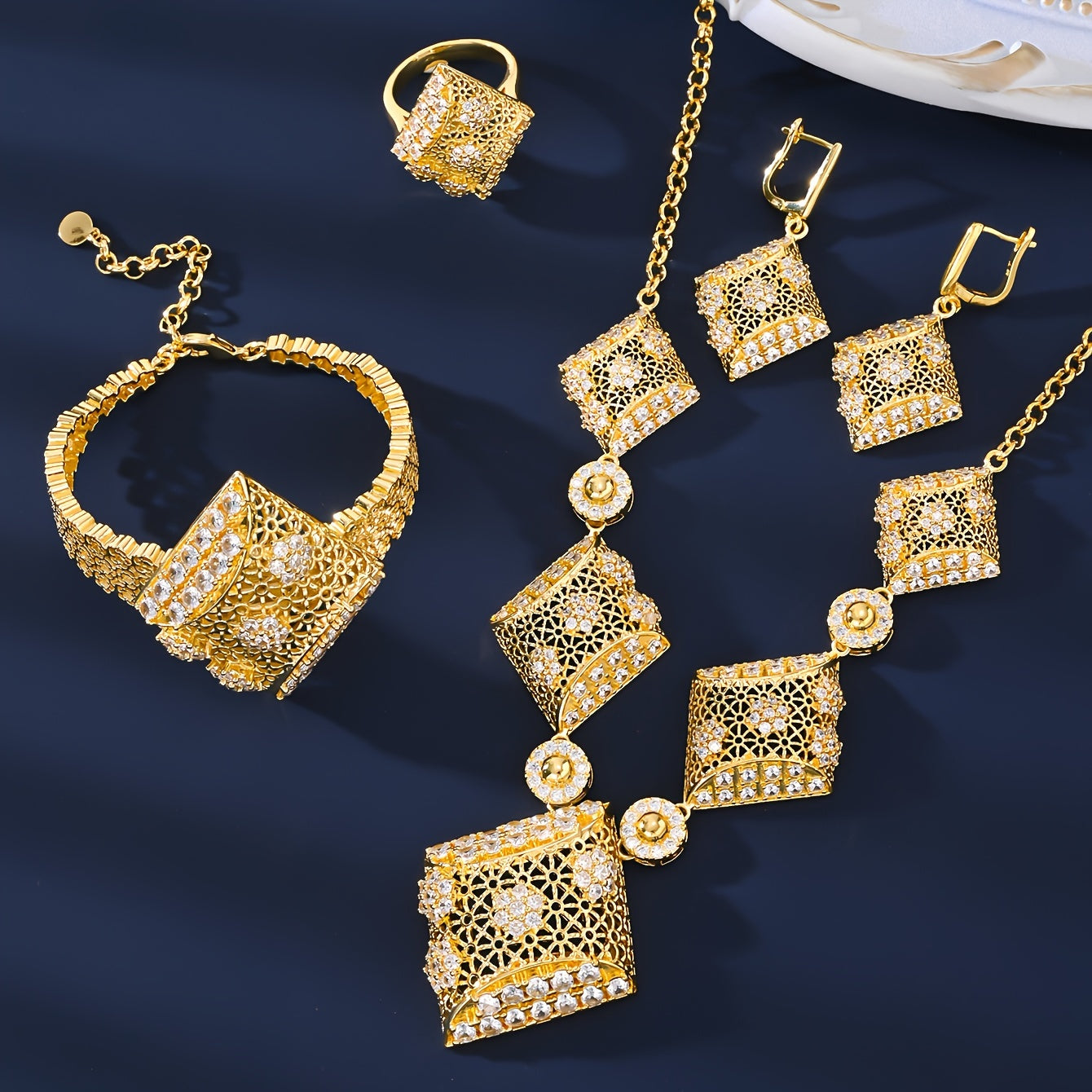 Indulge in Opulence with the MEIZ Luxury Bohemian Jewelry Set - 18K Golden Plated Copper adorned with Natural Zirconia Stones. Perfect for Daily Wear or Special Gifts for Women, this versatile Earrings, Necklace, and Ring Set is inspired by a Holiday